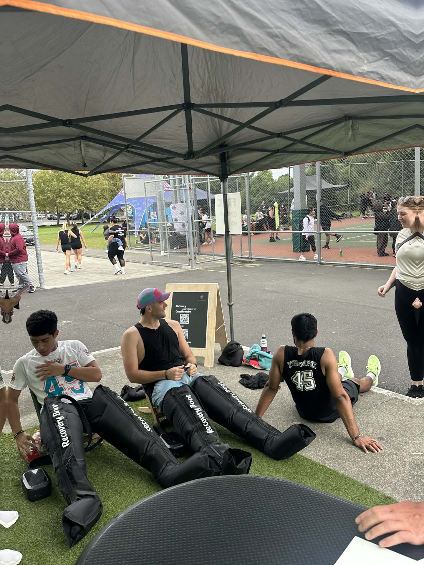 An ice bath in use at an outdoor event